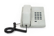 Front view of a grey vintage telephone from the eighties isolated on completely white background