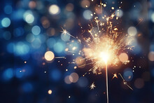 Happy New Year! A sparkler burns brightly, emitting shiny sparks against a bokeh festive Silvester party background