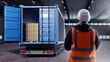 Truck with container. Man logistician with his back to camera. Truck inside industrial hangar. Pallets with boxes delivered to warehouse. Parcel in back of truck. Logistician in industrial building