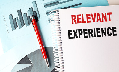Poster - RELEVANT EXPERIENCE text on a notebook with pen on a chart background