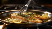 Sole Meunière Being Prepared In A Frying Pan With Butter, Capers, And Lemon