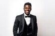 © igolaizola - Handsome african american man in tuxedo on white background