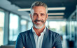 © Formatoriginal - Portrait of a Smiling confident mature CEO businessman leader on office. AI generative
