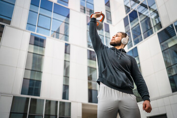 One man young adult caucasian male train with kettlebell girya weight