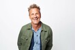 © igolaizola - Portrait of a handsome mature man laughing against a white background.