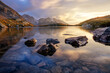 © plpictures by Paedii Luchs/Stocksy - Peaceful evening light at an alpine lake.
