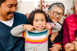 © Erin Brant/Stocksy - little happy asian girl together with her family