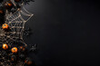 Leinwandbild Motiv Happy halloween flat lay mockup with spiders, decoration and spider web on black background. Autumn holiday concept composition. Top view with copy space. Generated ai.