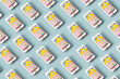 © Yaroslav Danylchenko/Stocksy - Pattern of repeated paper house inside smartphone mockup.