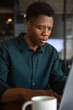 © Jovo Jovanovic/Stocksy - Black entrepreneur focused while typing on computer