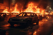 © J S - Riot protest in a ghetto suburb such as Paris or Stockholm -  burning car in fire flames in the immigration region street with copy space