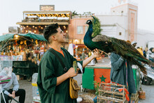 Man With Birds In A Moroccan Market