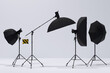 © boule1301 - Photography studio flash on a lighting stand on white background