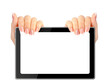 © Tanuha - Female hands holding a tablet touch computer gadget with isolated on white background.