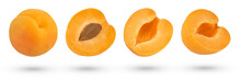Pitted Apricot Slices On A White Isolated Background. Apricot Slices With Pits On Different Sides To Insert Into A Design Or Project. Isolate Of Halves And Whole Apricots.