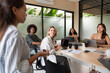 © Hernandez & Sorokina/Stocksy - Listening To The Presentation In Office