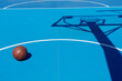 © Pansfun Images/Stocksy - basketball on court