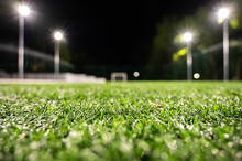 Green Grass Field Background For Soccer And Football Sports, Volleyball. Green Lawn Pattern And Texture Background. Close-up Image