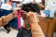 © Alvaro Lavin/Stocksy - woman cutting another woman's hair at home