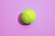 © Colour Laboratory/Stocksy - Tennis ball on a colorful background with hard lighting