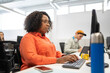 © Santi Nuñez/Stocksy - Young businesswoman using laptop in office