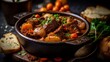 © bartjan - Beef Bourguignon served in a cast iron pot with a side of crusty bread