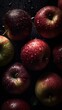 Many ripe juicy red apples covered with water drops, close-up, selective focus, ripe fruits as a background