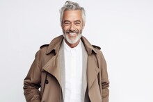 Portrait Of A Smiling Senior Man In Coat Isolated On A White Background