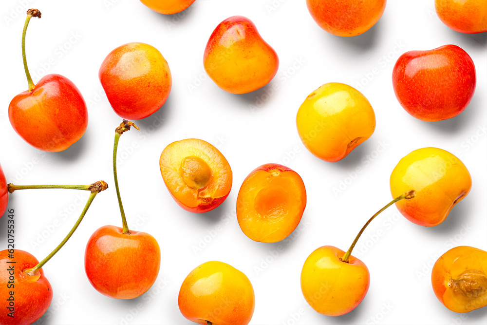 Many sweet yellow cherries on white background