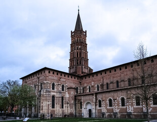 Wall Mural - Architectural detail of the Basilica of Saint-Sernin, a church in Toulouse, France, and former abbey church of the Abbey of Saint-Sernin or St Saturnin