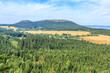 Szczeliniec Wielki and Szczeliniec Mały seen from the red tourist trail near Fort Karola in the Central Sudetes in the Stołowe Mountains (Poland)