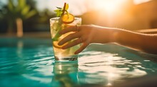 Beautiful American Female Hand Holding Mojito Cocktail In Glass Garnished With Mint On Hotel Resort, Woman Relaxing, Drinking, Swimming Pool Background, Bokeh, Summer, Bright Sunlight, AI Generated.