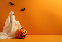 Halloween Ghosts With Funny Pumpkin On Orange Background. Happy Halloween Holiday Concept.
