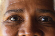 © Wavebreak Media - Portrait of eyes of senior african american woman