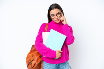 Wall Mural - Young student woman isolated on white background thinking an idea