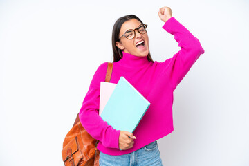 Wall Mural - Young student woman isolated on white background celebrating a victory