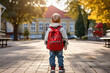 Small kid with backpack going to school for the first time. Back to school concept