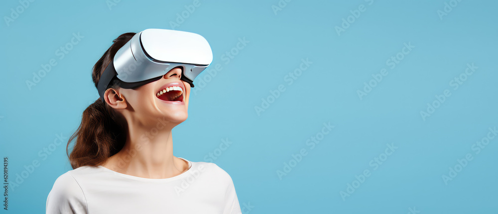 Joyful young woman smiling in white virtual reality glasses isolated on ...