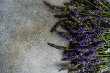 Overhead View Of Lavender Flowers On A Grey Background