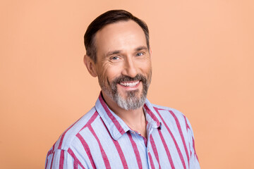 Wall Mural - Portrait of friendly nice person with white gray beard dressed colorful shirt smiling at camera isolated on pastel color background