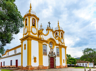 Wall Mural - Baroque church facade with its towers in downtown of the historic city of Tiradentes in Minas Gerais