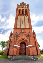 Wall Mural - General view and architectural details of the Neo-Gothic Catholic Church of St. Joseph in Kobułty, Masuria, Poland.