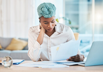 Wall Mural - Reading, serious and black woman with accounting paperwork, company budget and tax work. Confused, freelance and remote African corporate accountant with documents for financial or investment report