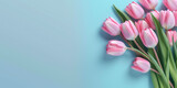Fototapeta Tulipany - Bouquet of pink tulips on a blue background. Place for text. By Generative AI.