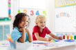 © famveldman - Kids back to school. Group of children.