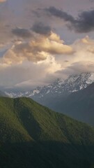 Wall Mural - beautiful sunset in the smoky mountains, caucasus, russia, timelapse. vertical video