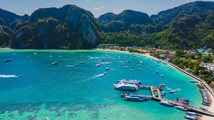 Wall Mural - High angle view of the sea, Koh Phi Phi, a major tourist attraction Soak up the sun or go on an adventure trip. Take a walk and take pictures with the white beach mountains.