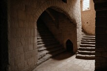 A Narrow Staircase Winding Up A Medieval Tower