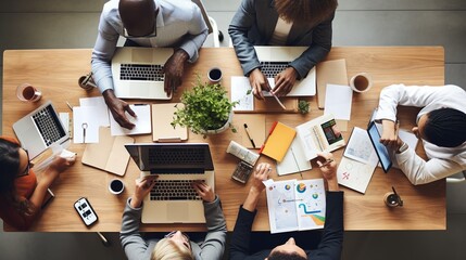 Poster - Top view of group of multiethnic busy people working in an office, Aerial view with businessman and businesswoman sitting around a conference table with blank copy space with generative ai