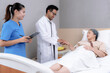 © Basicdog - Doctors and nurses helping and caring for old people at nursing homes.